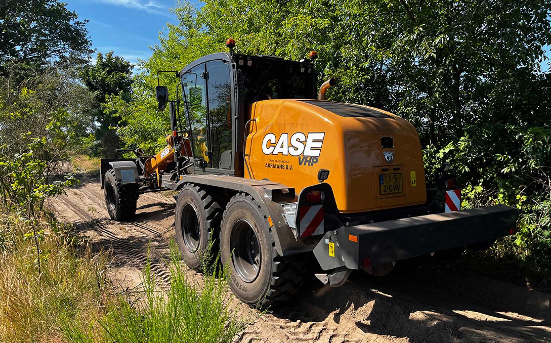 Case 856D AWD grader met joysticks voor Adriaans