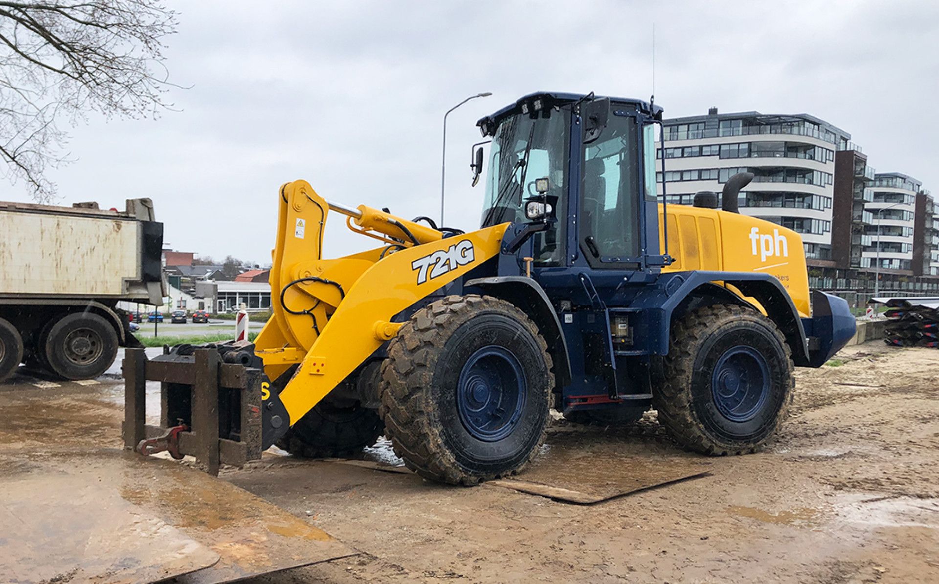 Case 721G wiellader voor F.P.H. Ploegmakers